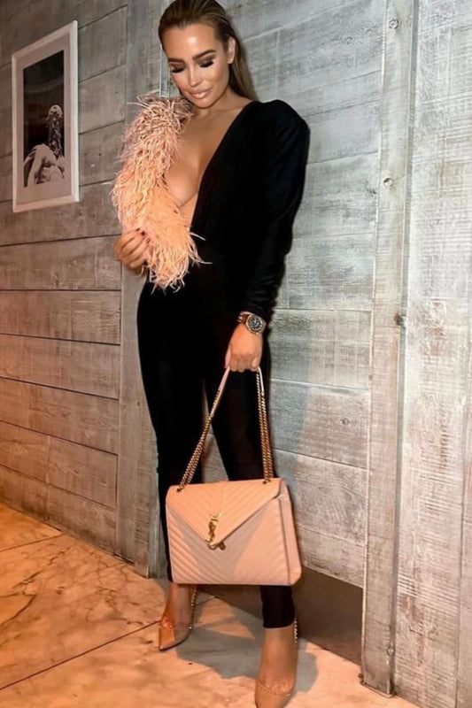 AURA PADDED SHOULDER PLUNGE JUMPSUIT WITH OSTRITCH FEATHER